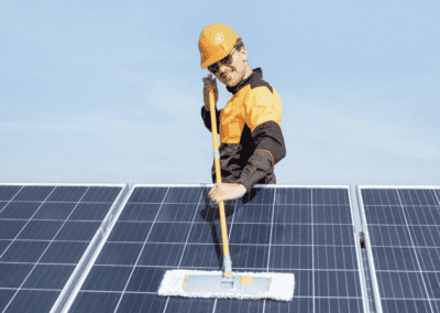 R&R Windows Cleaning & Maintenance worker cleaning Solar Panel